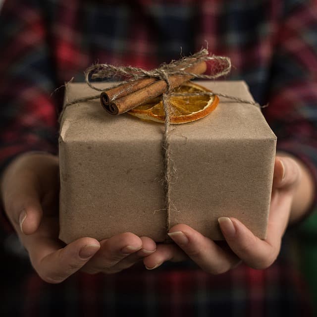 person holding a gift box